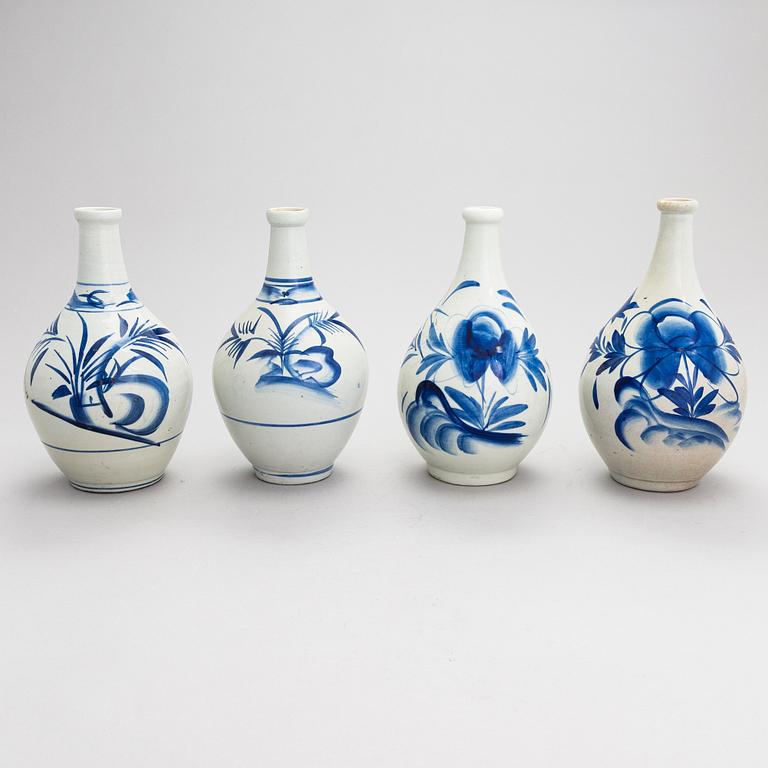 Seven ceramic sake bottles, Japan, the first half of the 20th century.