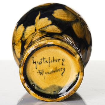 Gunnar G:son Wennerberg, an Art Nouveau glazed creamware vase, Gustavsberg, Sweden, early 20th century.