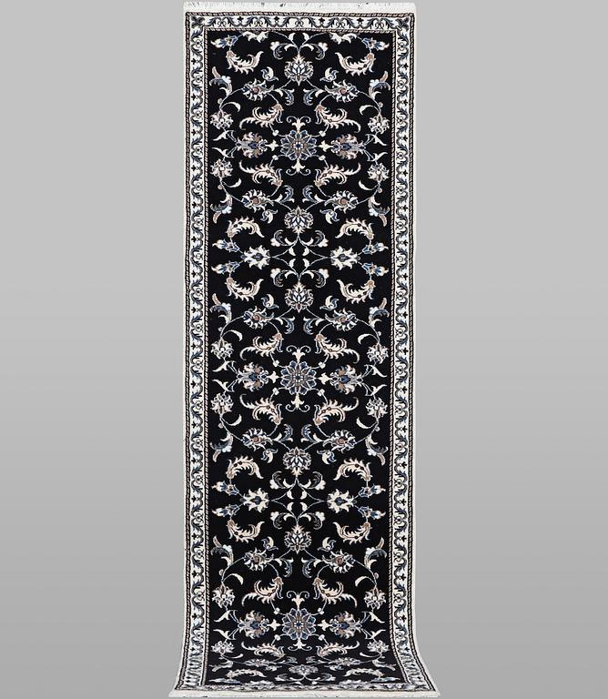 A runner carpet, Nain, part silk, ca 293 x 77 cm.