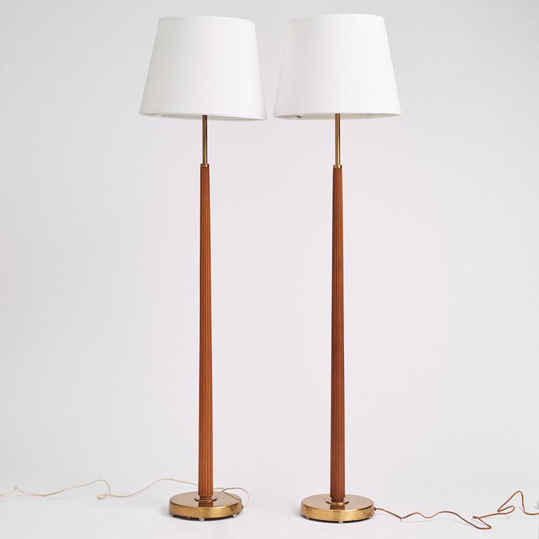 Hans Bergström, a pair of floor lamps model "522", ateljé Lyktan, Åhus 1950s.