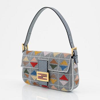 Fendi, a pearl embroidered baguette bag.