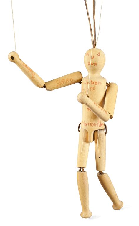 A WOODEN PUPPET,