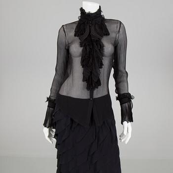 A skirt, topp and a blause by Ralph Lauren.