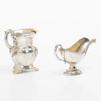 A silver gravy boat, Germany, and a silver creamer, johan Petter Tullgren, Sweden, 1857.