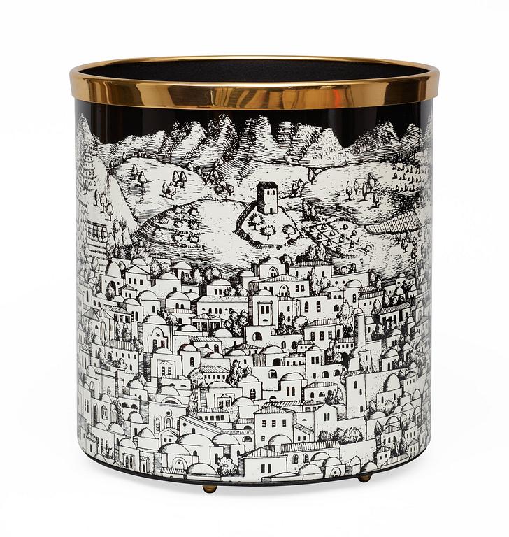 A Piero Fornasetti wastepaper bin, Milan, Italy.