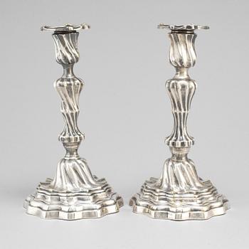 A pair of Louis XV mid 18th century candlesticks.