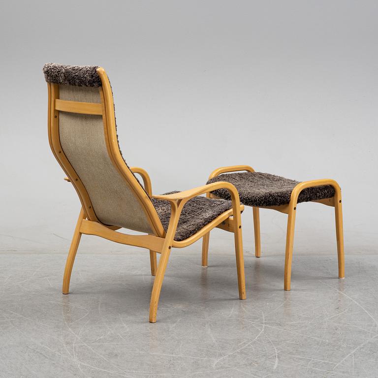 A 'Lamino' easy chair and stool by Yngve Ekström for Swedese, designed 1957.