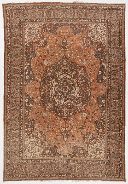 An antique Tabriz carpet, Northwest Persia, 453 x 310 cm.