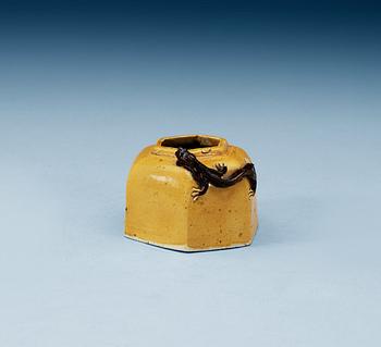 A yellow and brown glazed biscuit brush washer with curling dragon, Kangxi (1664-1722), with Xuande four character mark.