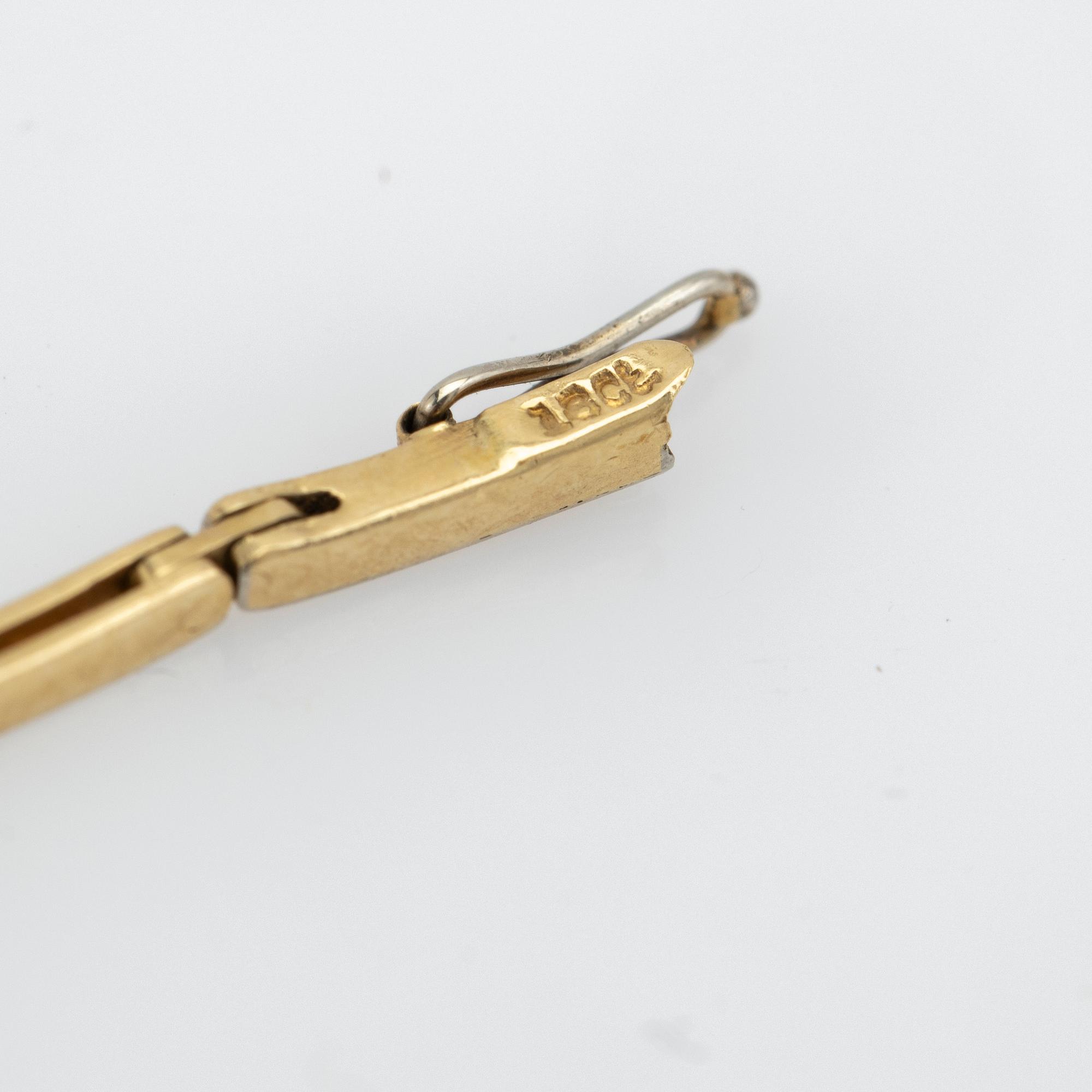 Bracelet, 18K gold with a centre piece set with diamonds.