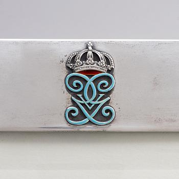 A silver and enamel frame with glass, mark of CG Hallberg, Stockholm 1935.