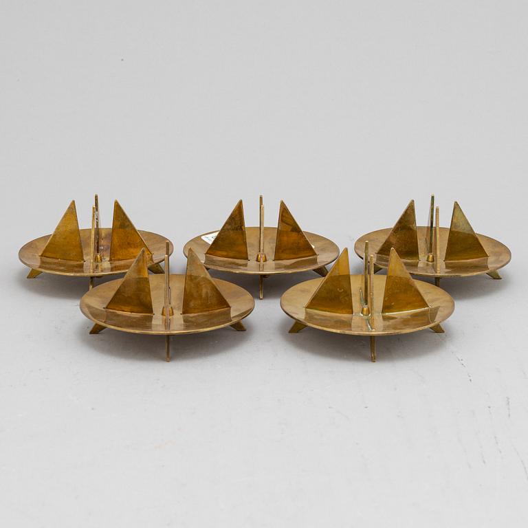 Pierre Forssell, a set of five brass 'no 20' candlesticks from Skultuna.