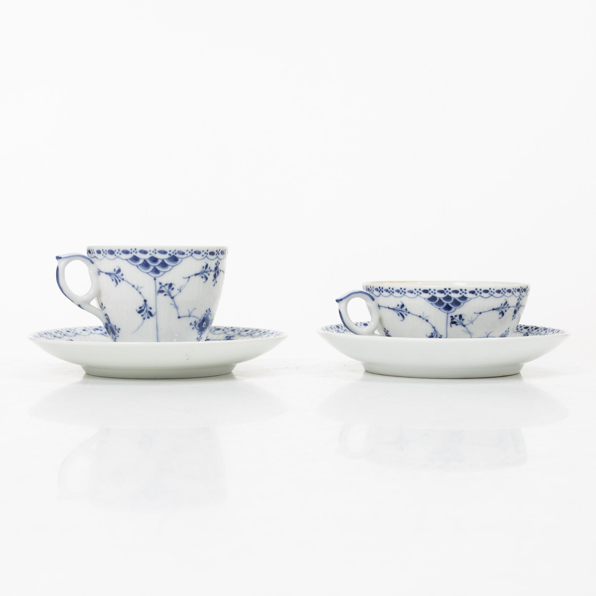 Royal Copenhagen, A 'Blue Fluted Half Lace" 30 pieces breakfast service, 'Musselmalet', partly 1889-1922 but also post 1923.