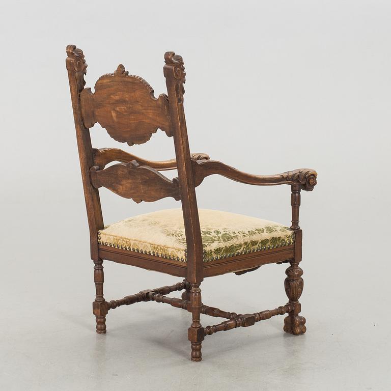 A BAROQUE STYLE ARMCHAIR CA 1900.