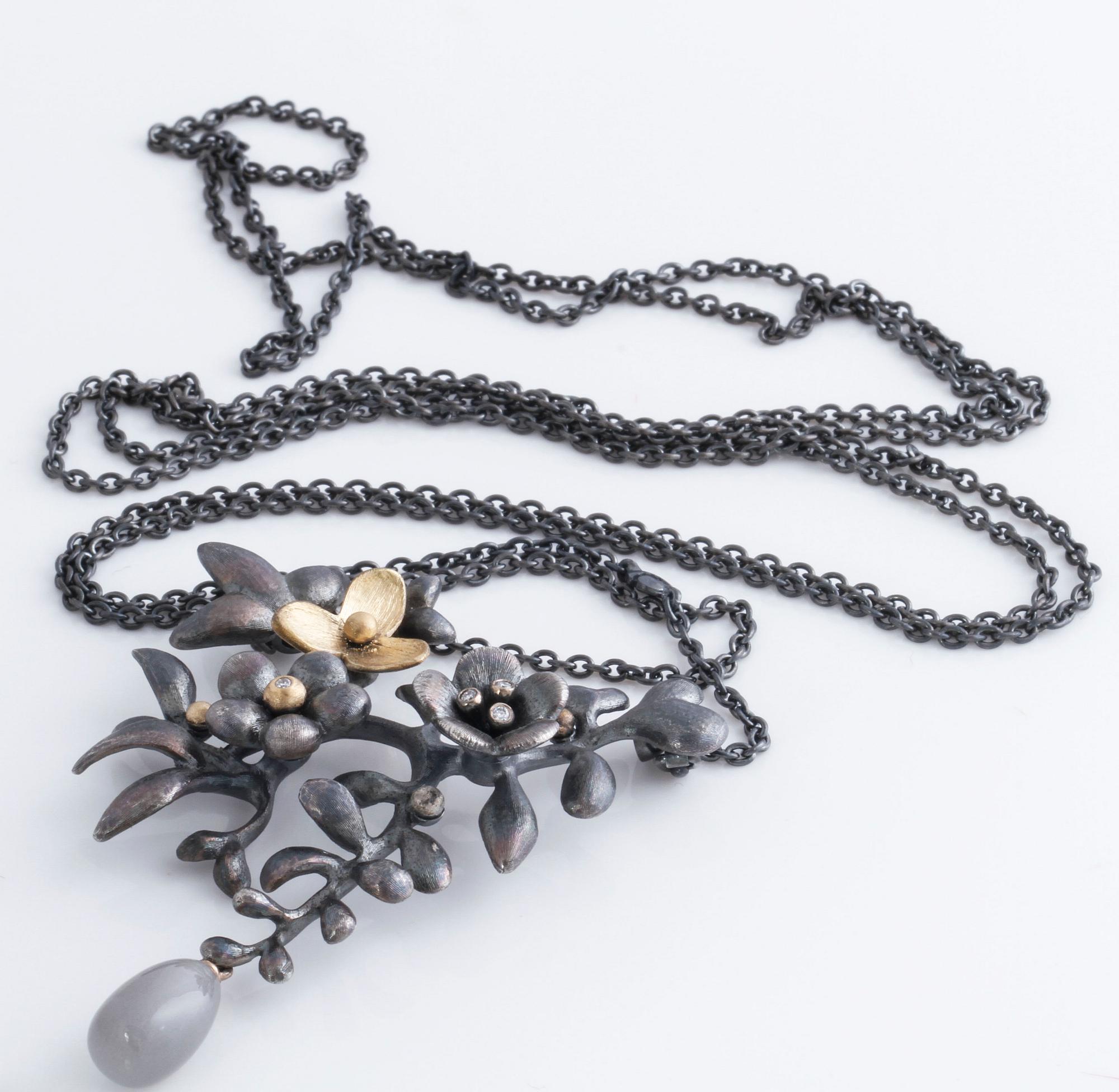 A moonstone and brilliant cut diamond necklace by Ole Lynggaard.