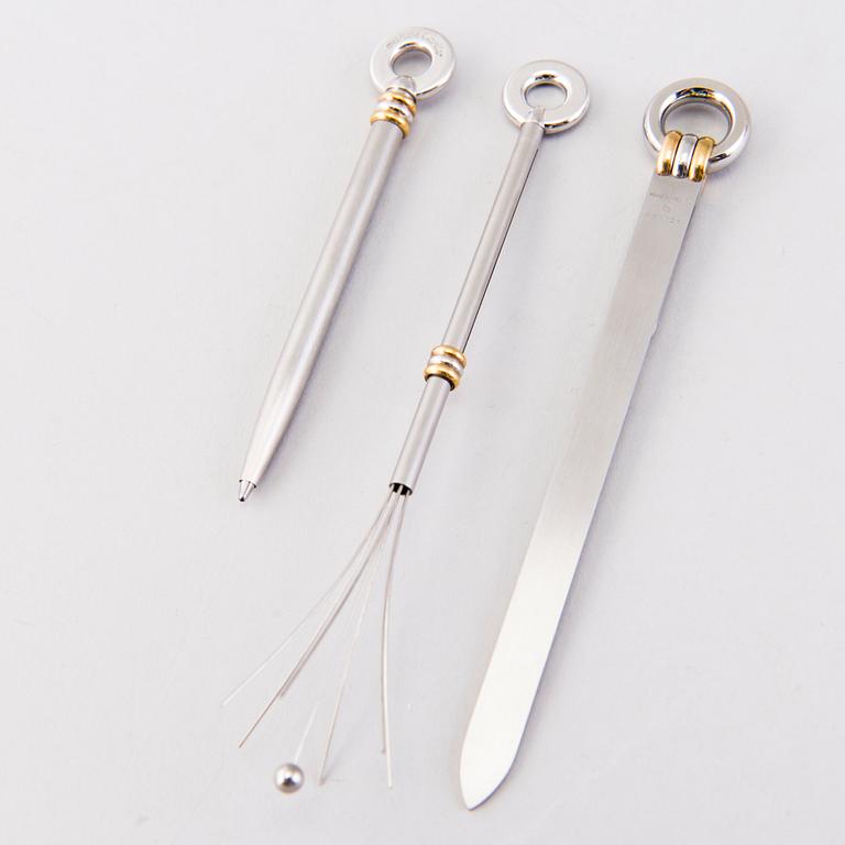 A PEN, CHAMPAGNE BEATER and BOOK MARK, must de Cartier.