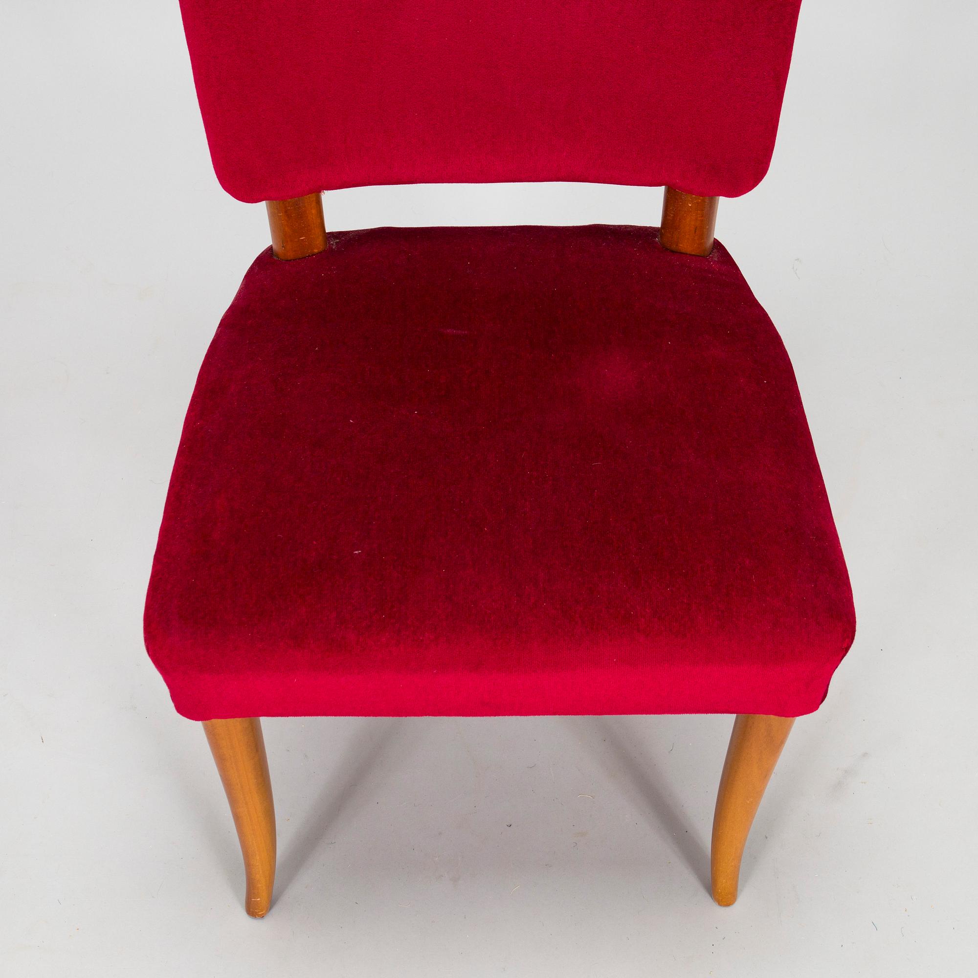 A mid 20th century dining table and a set of four chairs, Oy Boman Ab and two chairs Werner West.