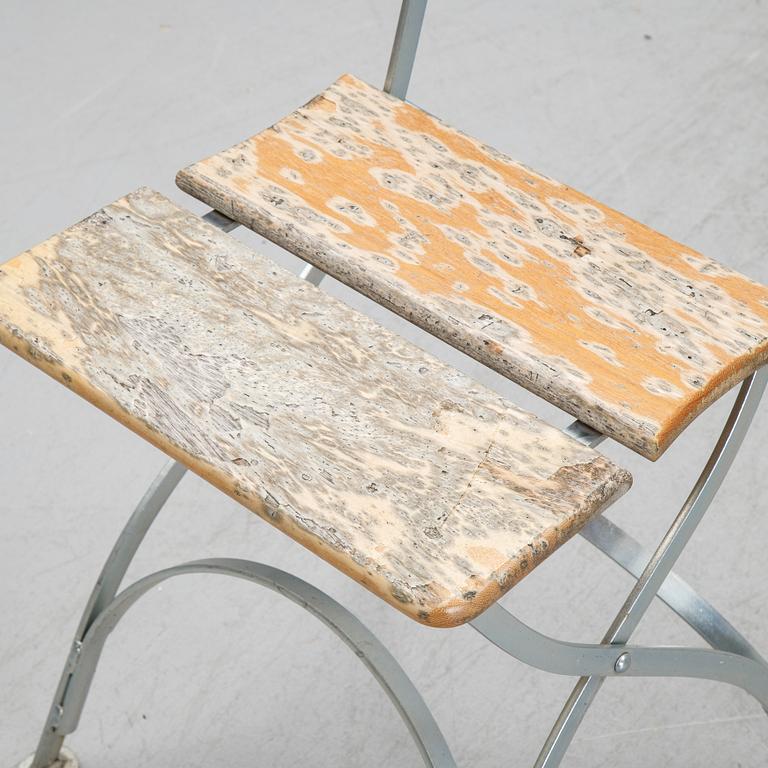 A set of four chairs and one table, Grythyttan, late 20th century.