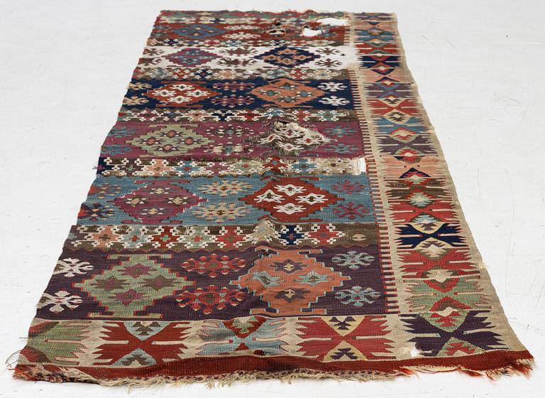 An antique kilim fragment, central Anatolia, c. 238 x 82 cm.
