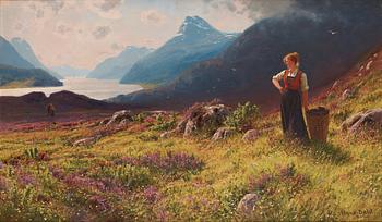848. Hans Dahl, Woman in a fjord landscape.