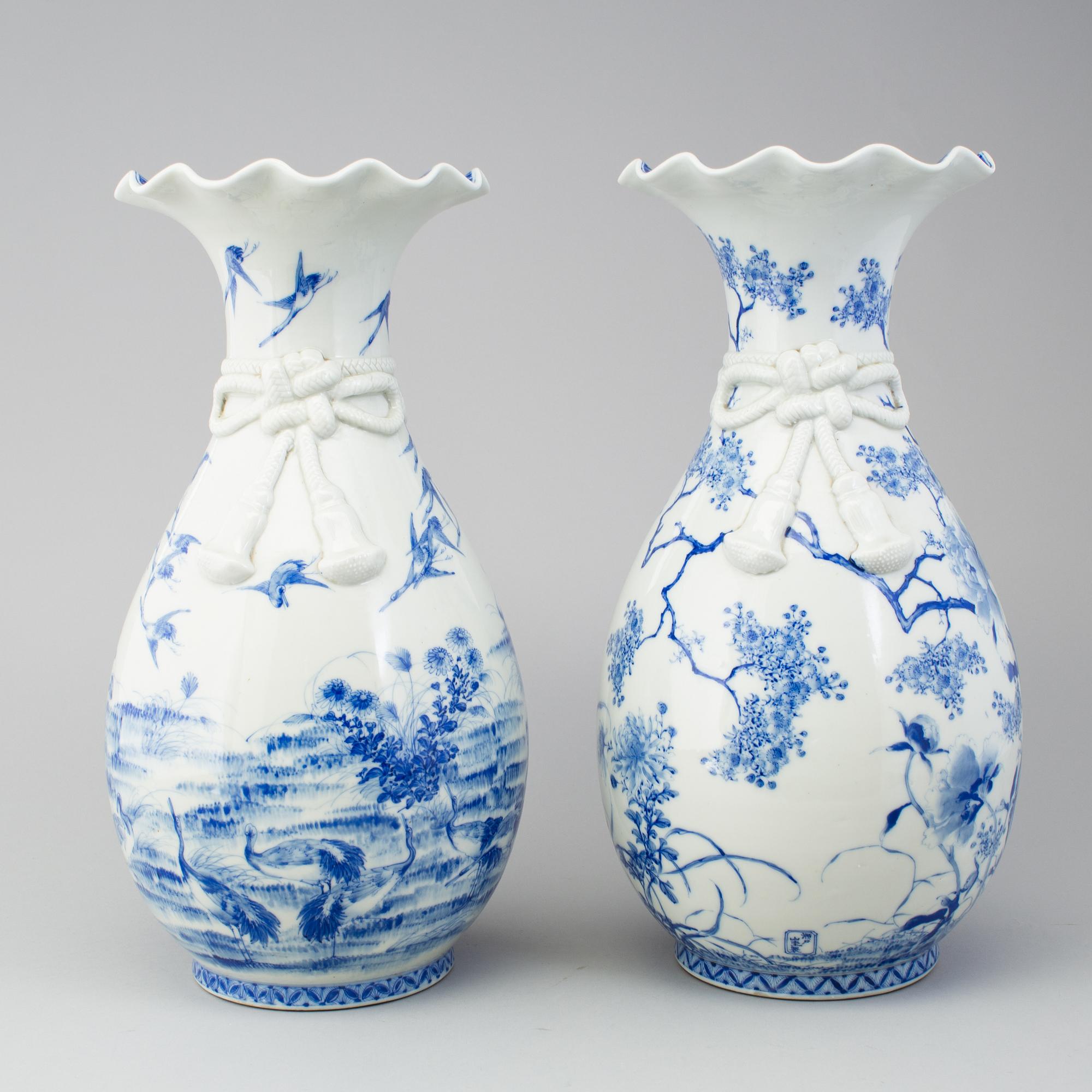 A matched pair of blue and white vases, Japan, early 20th Century.