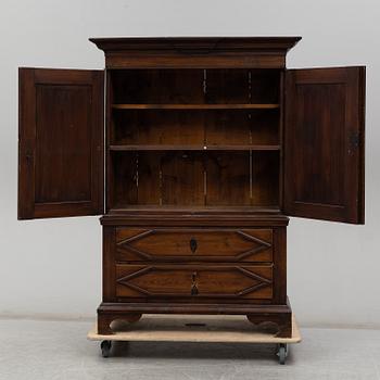 An 18th/19th century cabinet.