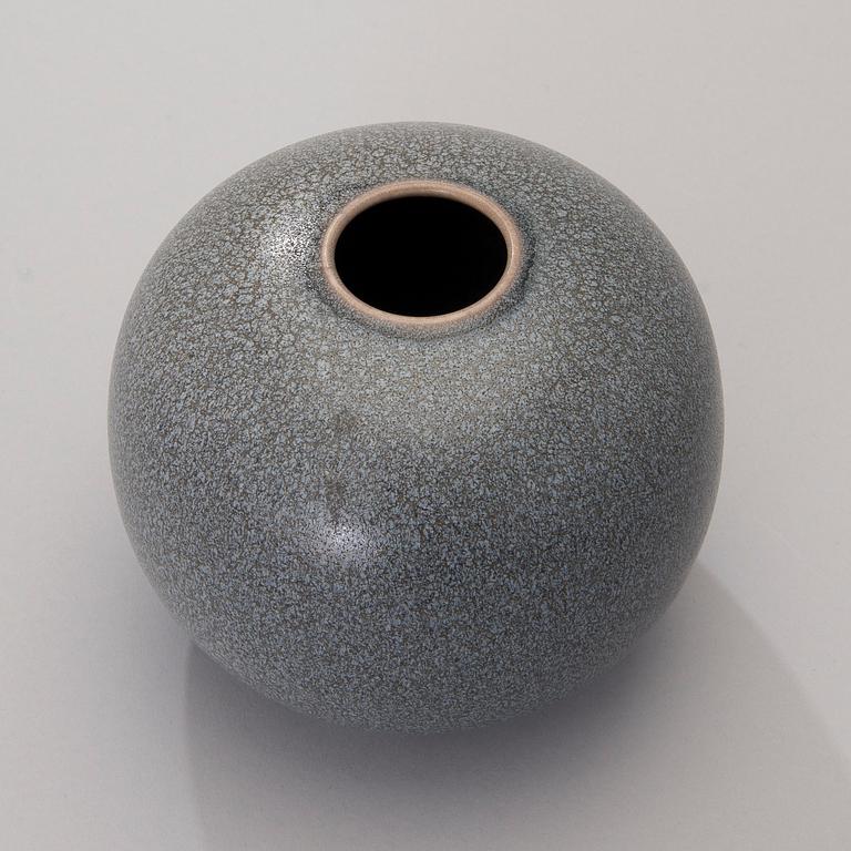 a ceramic vase, signed Tobo.