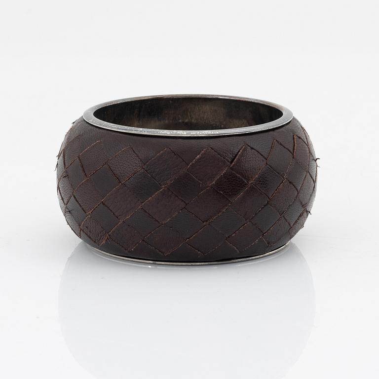 Bottega veneta, a leather and silver bangle.