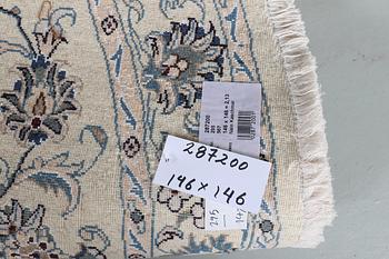A rug, Nain, part silk, ca 146 x 146 cm.