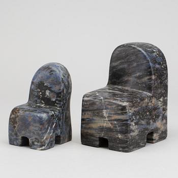 POUL ISBAK, a set of two signed and dated sculptures.