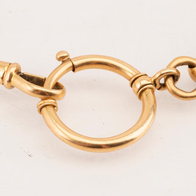 An 18K gold watch chain from year 1900.