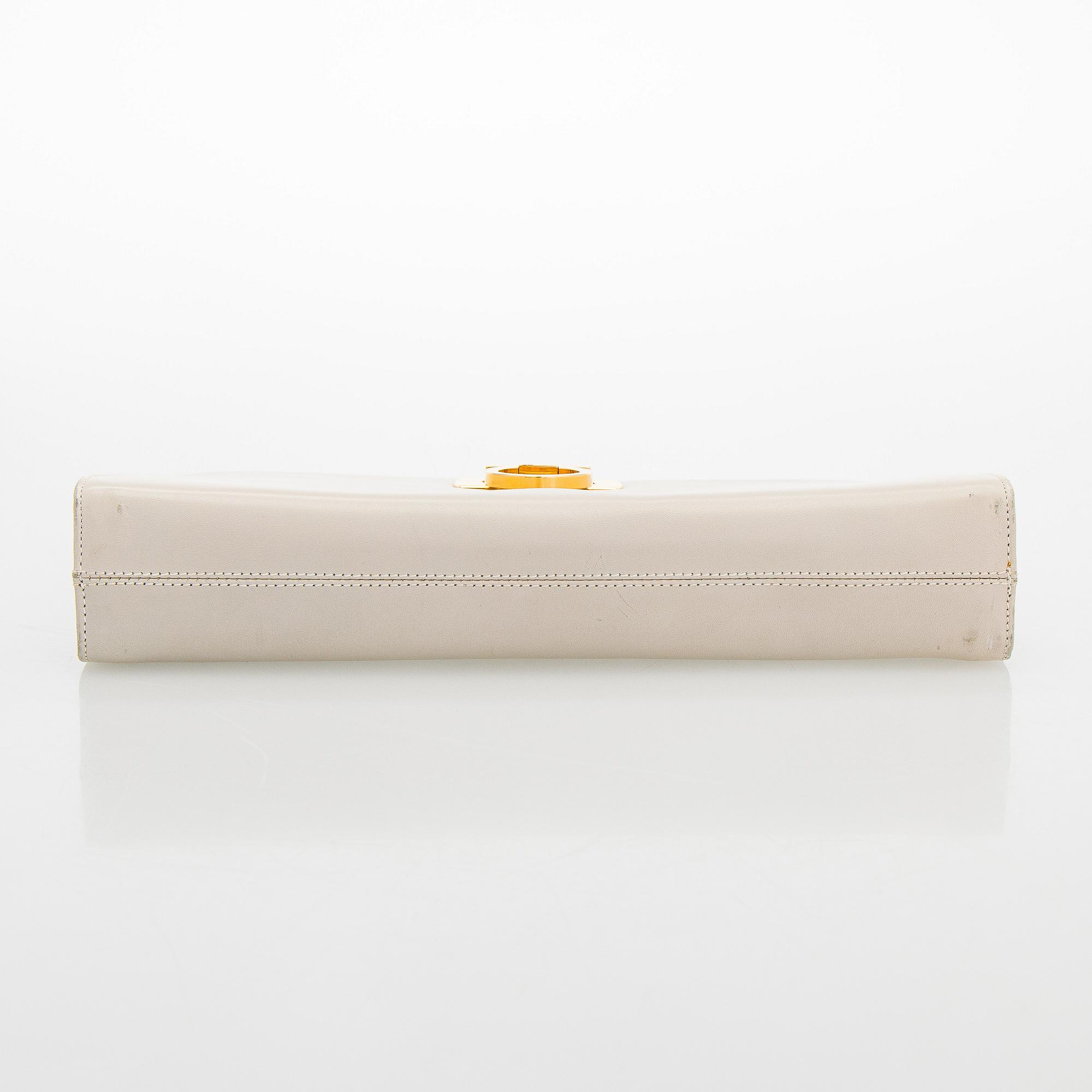 Salvatore Ferragamo, a leather “Gancini”bag.
