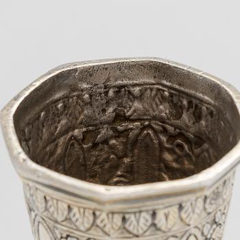 A parcel-gilt silver repoussé water pipe huqqa base, 18th/19th Century.
