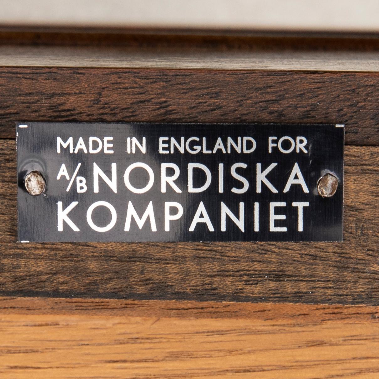 A pair of NK mahogany side tables later part of the 20th century.