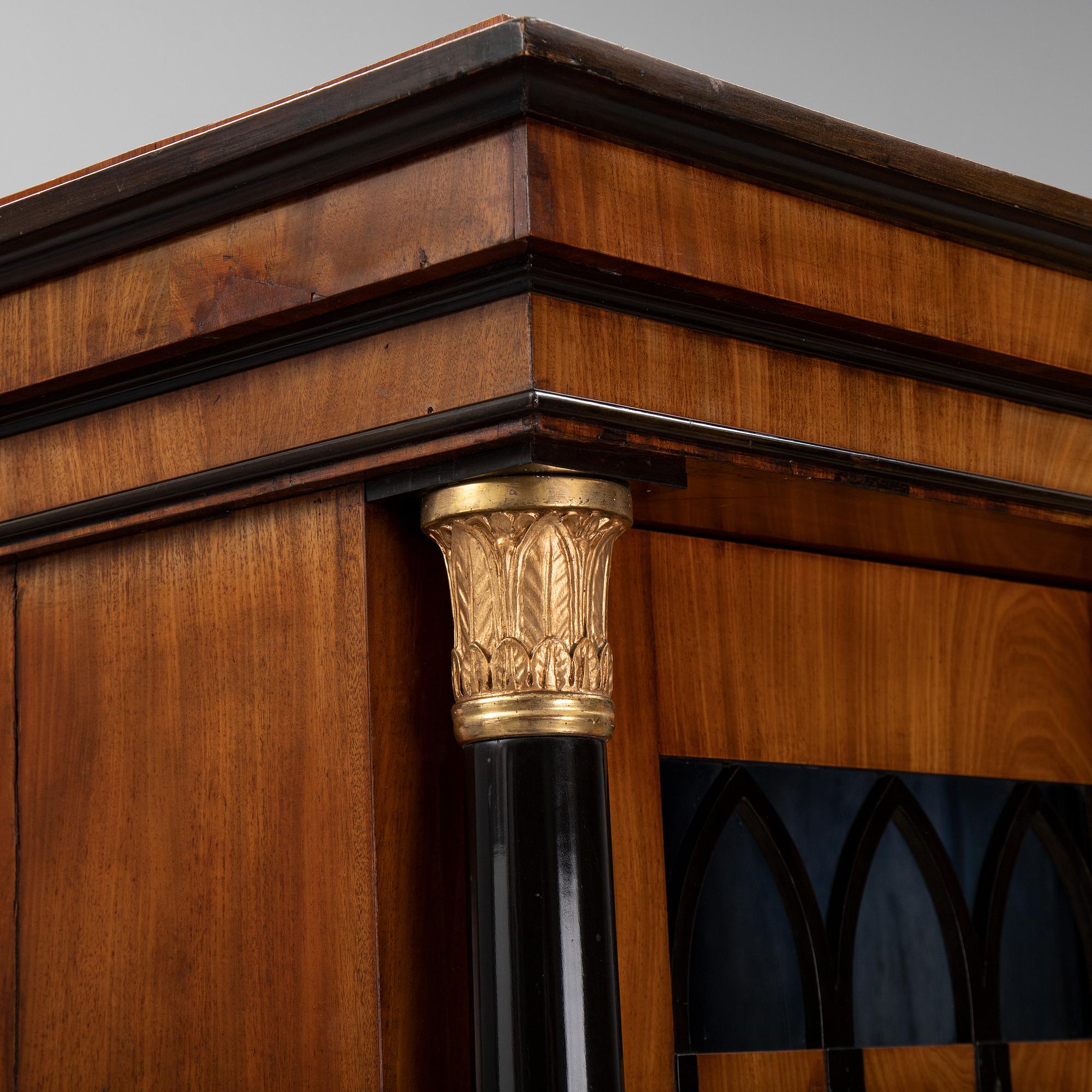 An Empire mahogany cabinet, first half of the 19th Century.