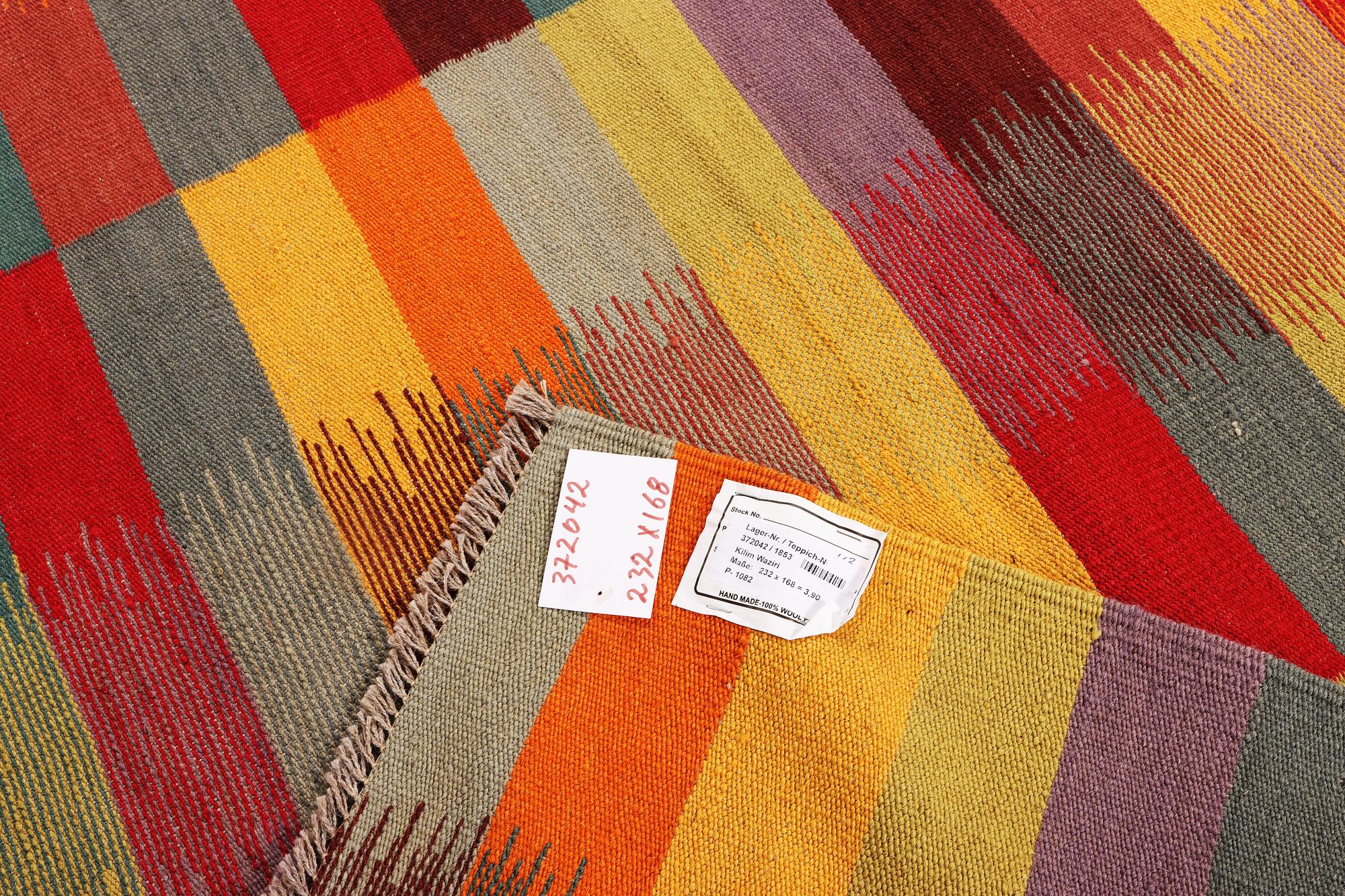 A Kilim rug, c. 232 x 168 cm.