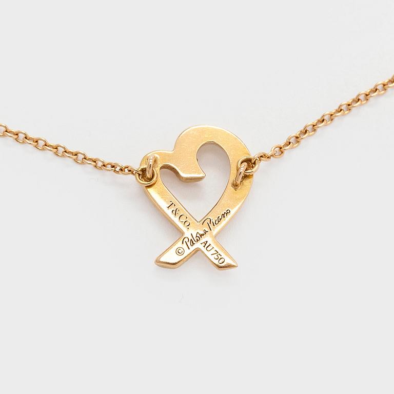 Tiffany & Co, Paloma Picasso, an 18K gold 'Loving Heart' necklace.