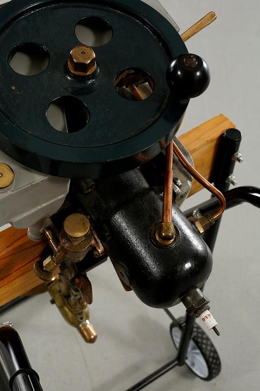 An early 20th century rowboat motor 
by Evinrude Detachable Rowboat Motor Company,
Milwaukee in Wisconsin.