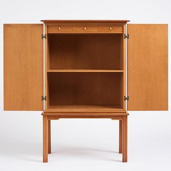 Oscar Nilsson, attributed to, a Swedish Modern oak cabinet, 1940s.