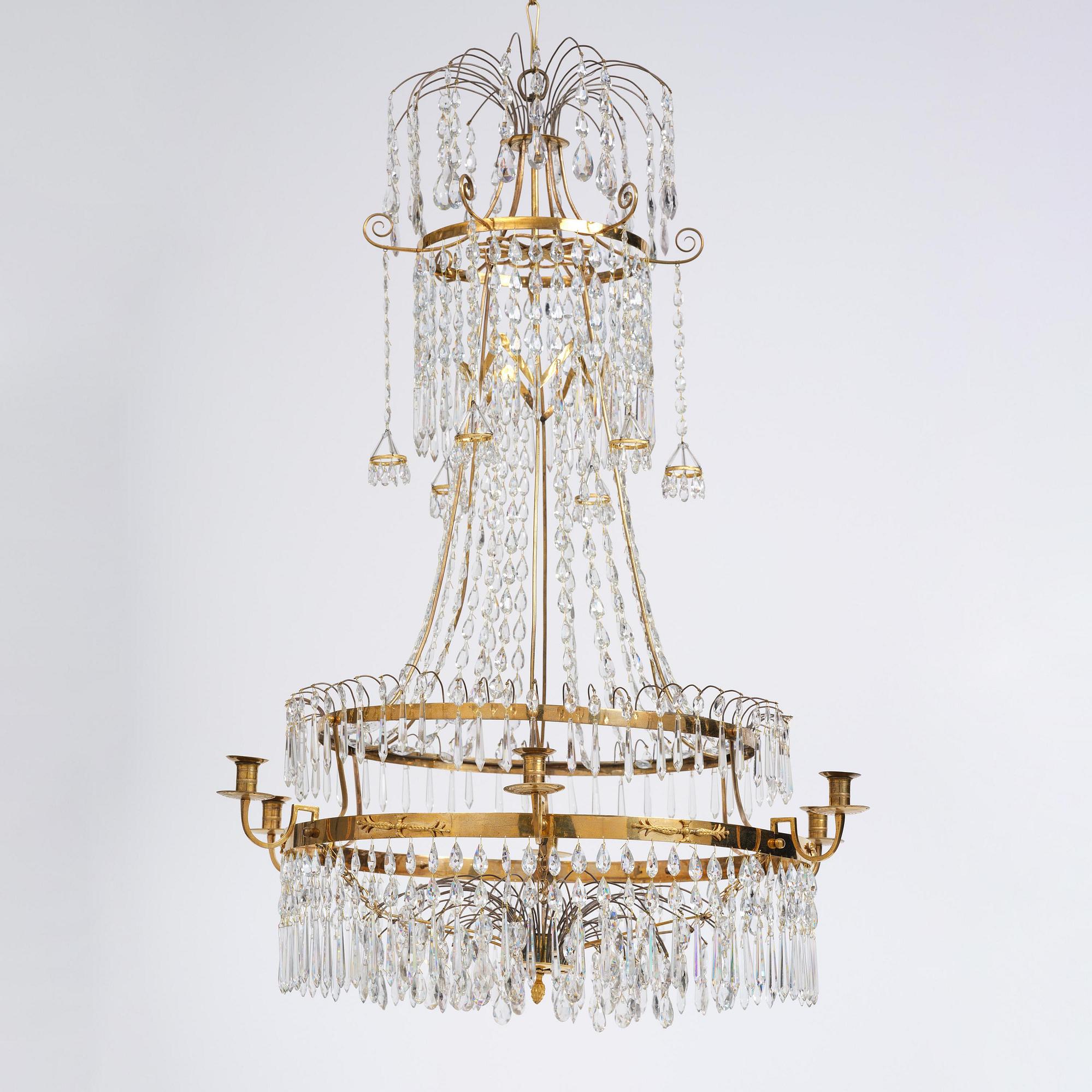 A late Gustavian gilt brass and cut glass seven-light chandelier, Stockholm, late 18th century.