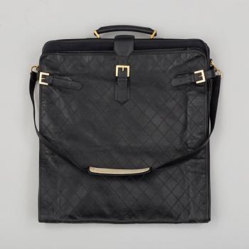 a CHANEL garment bag.