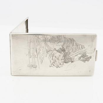 American silver cigarette case with engraving from World War II.