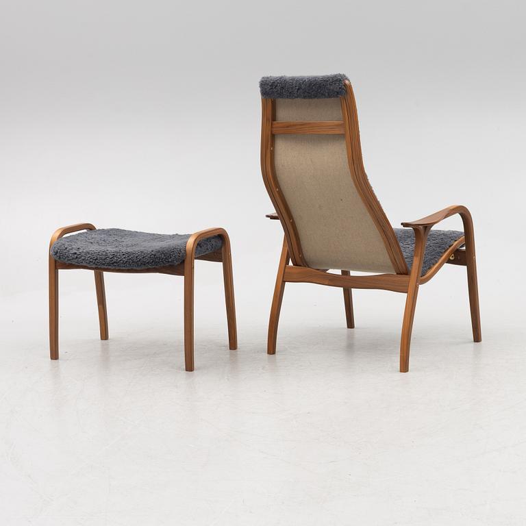 Yngve Ekström, fåtölj med fotpall, ”Lamino”,  Swedese, 2009.