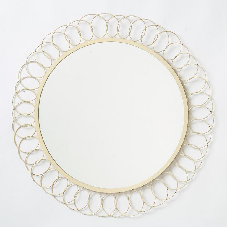 A painted metal mirror, first half of the 20th century.