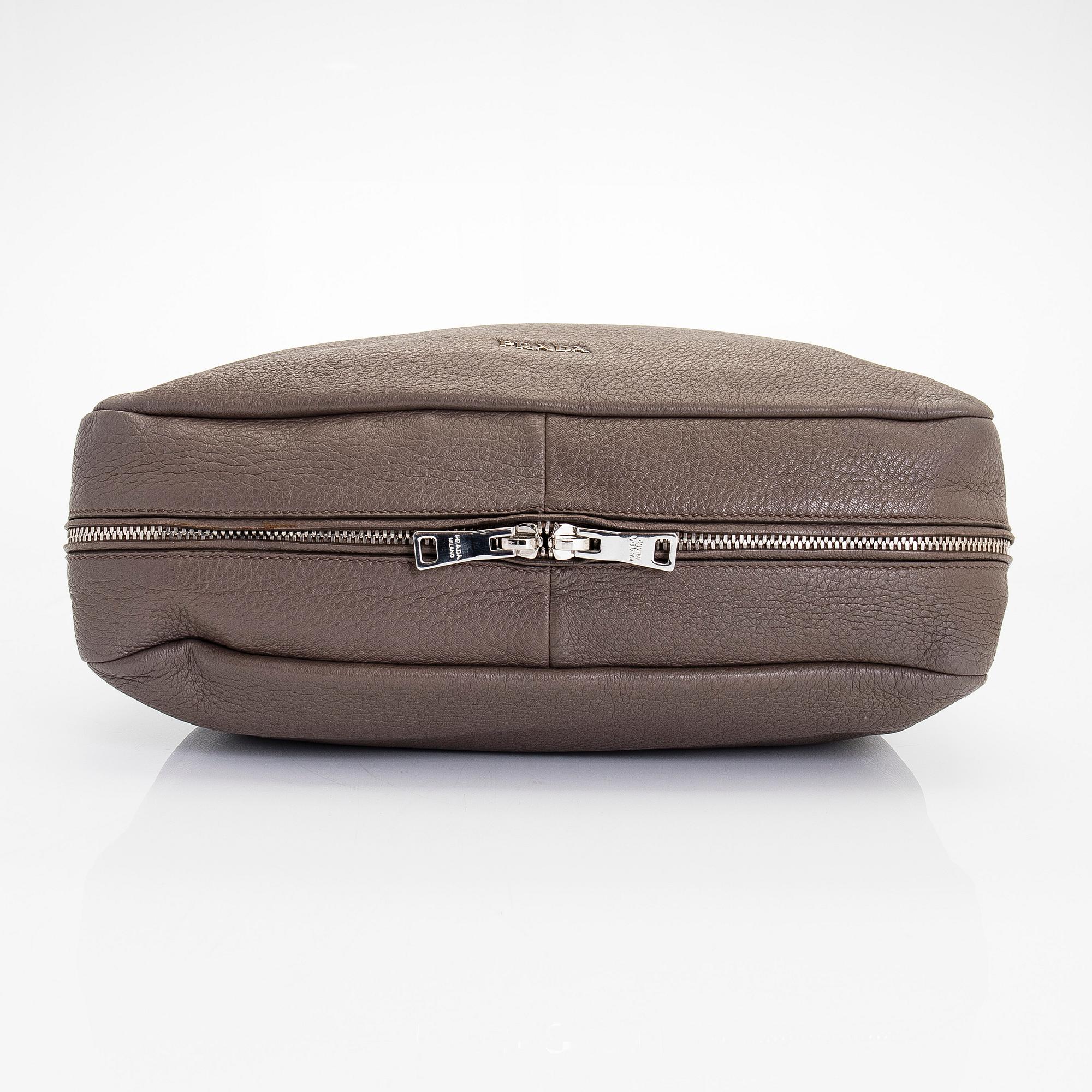 Prada, a 'Cervo Zipper Hobo' bag.
