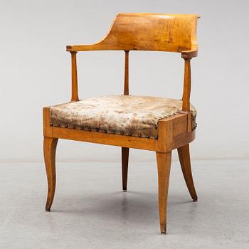 A Swedish Empire 19th century armchair.