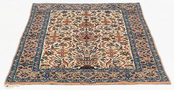 A rug, semi-antique, Esfahan, signed Ghena, ca 166 x 109 cm.