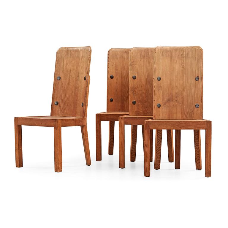 A set of four Axel Einar Hjorth 'Lovö' stained pine chairs, Nordiska Kompaniet, Sweden 1930's.