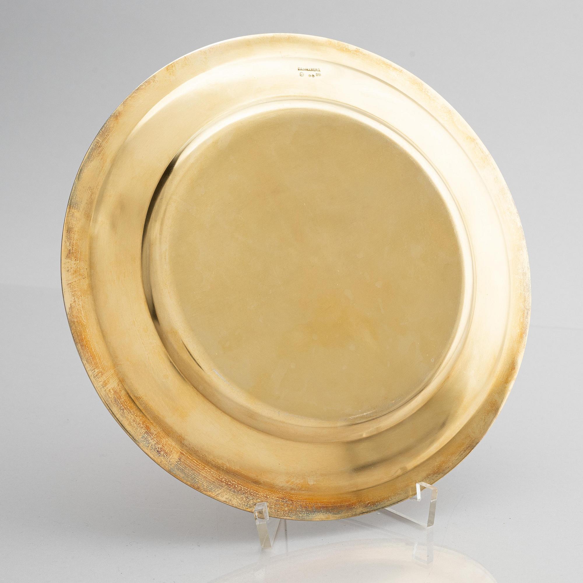 Twelve silver-gilt plates, mark of company C.G. Hallberg, Stockholm 1913-1917.