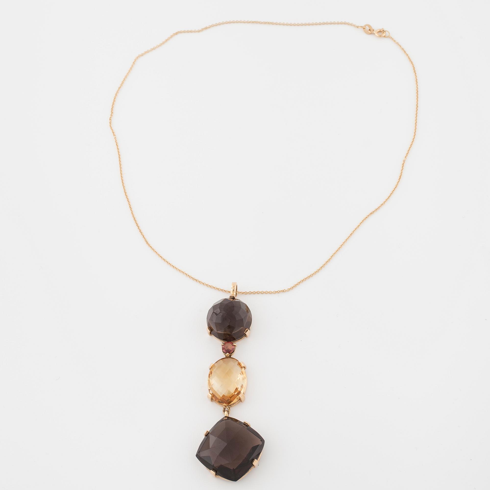A smokey quartz and citrine pendant.